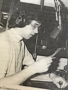 Bob Comstock, newsman, delivers the news at WIDB